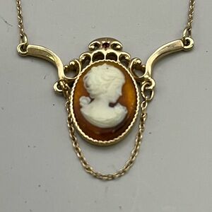Gold and White Cameo Necklace with Ornate Frame